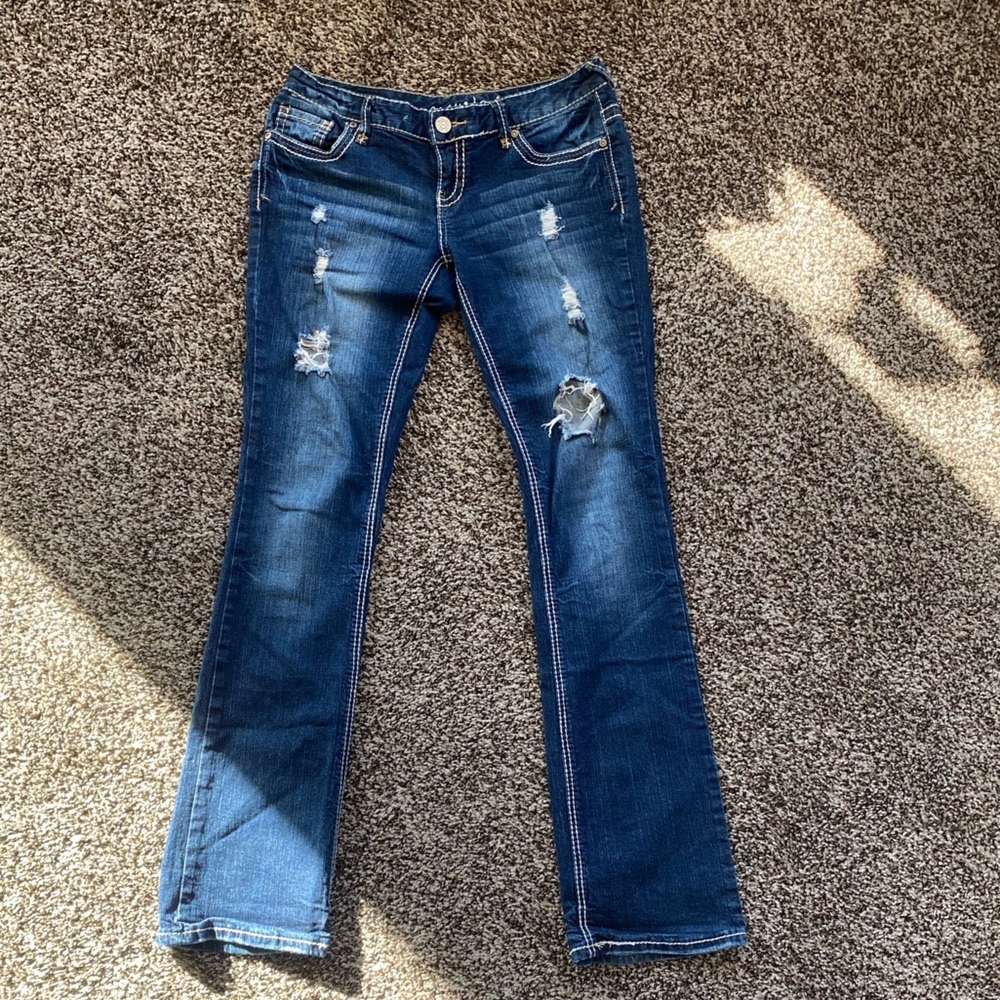 Maurices, ripped, boot cut jeans.